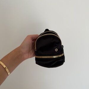 Lululemon Black Velvet Mini Backpack with Gold Accents